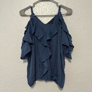blue off the shoulder shirt!